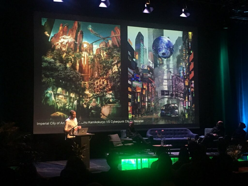 Jay Springett speaking on stage at Fiber Festival